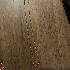 Roxanne Assoulin red letter J Charm Gold Necklace.